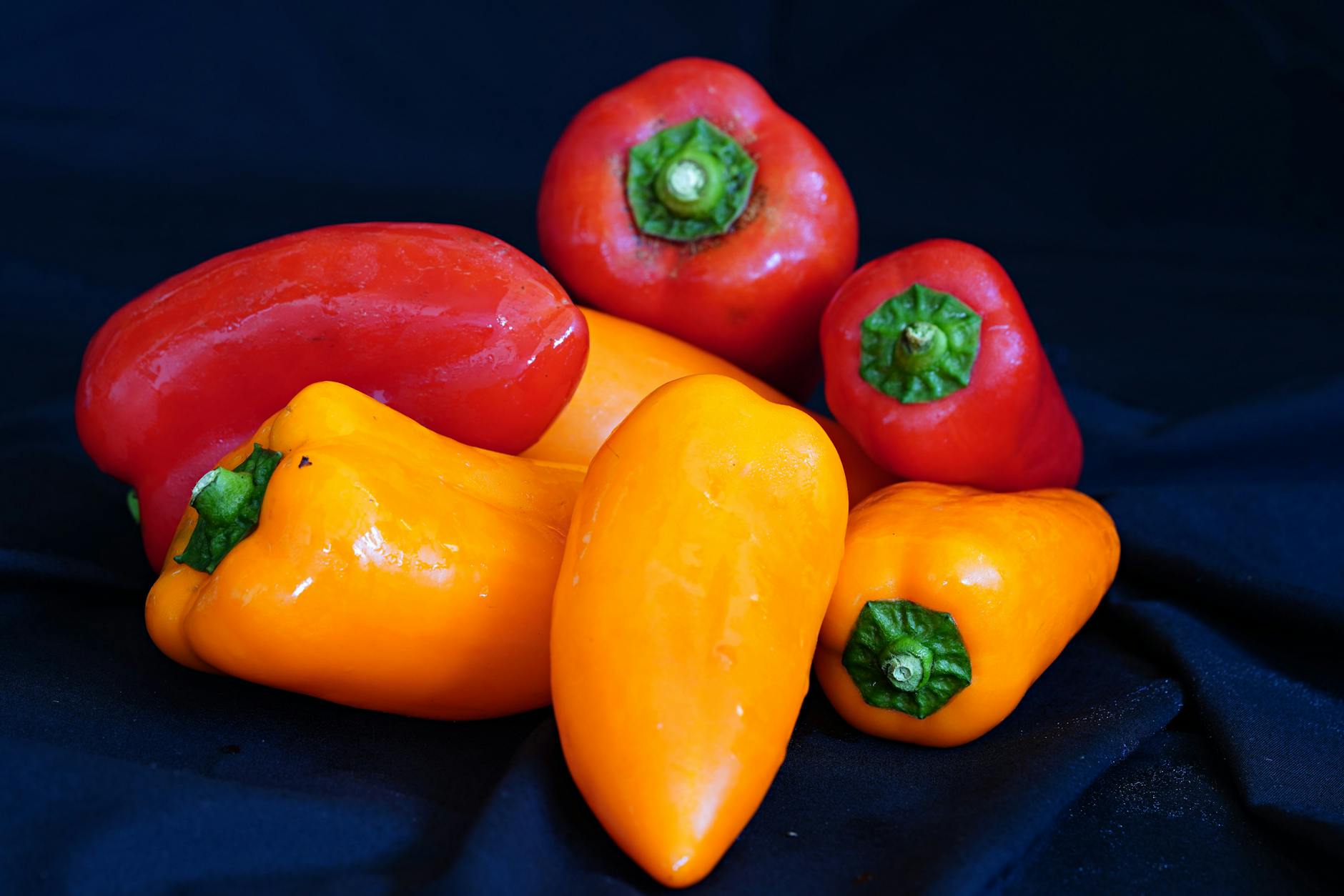 Colorful bell peppers and citrus fruits as natural vitamin C sources